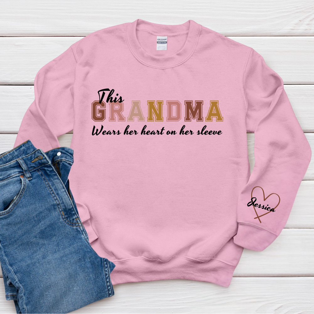 This Grandma Wears Her Heart On Her Sleeve - Family Personalized Custom Unisex Sweatshirt With Design On Sleeve - Gift For Mom, Grandma