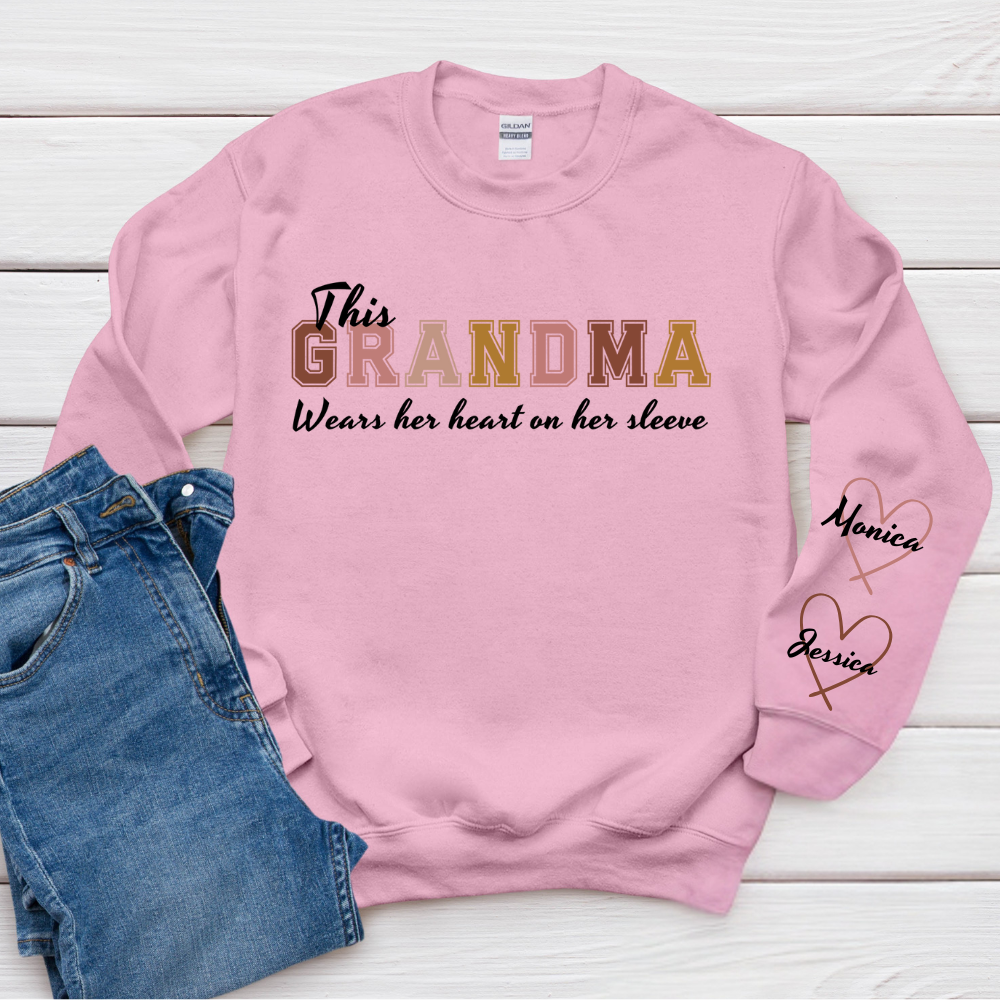 This Grandma Wears Her Heart On Her Sleeve - Family Personalized Custom Unisex Sweatshirt With Design On Sleeve - Gift For Mom, Grandma