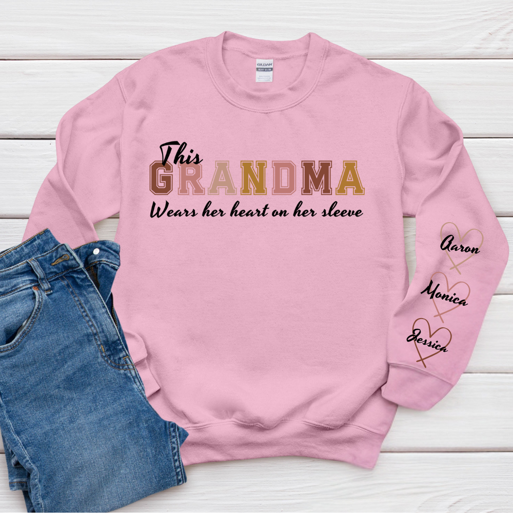 This Grandma Wears Her Heart On Her Sleeve - Family Personalized Custom Unisex Sweatshirt With Design On Sleeve - Gift For Mom, Grandma