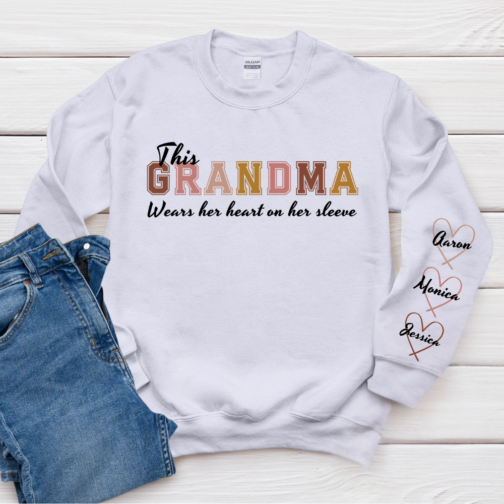 This Grandma Wears Her Heart On Her Sleeve - Family Personalized Custom Unisex Sweatshirt With Design On Sleeve - Gift For Mom, Grandma