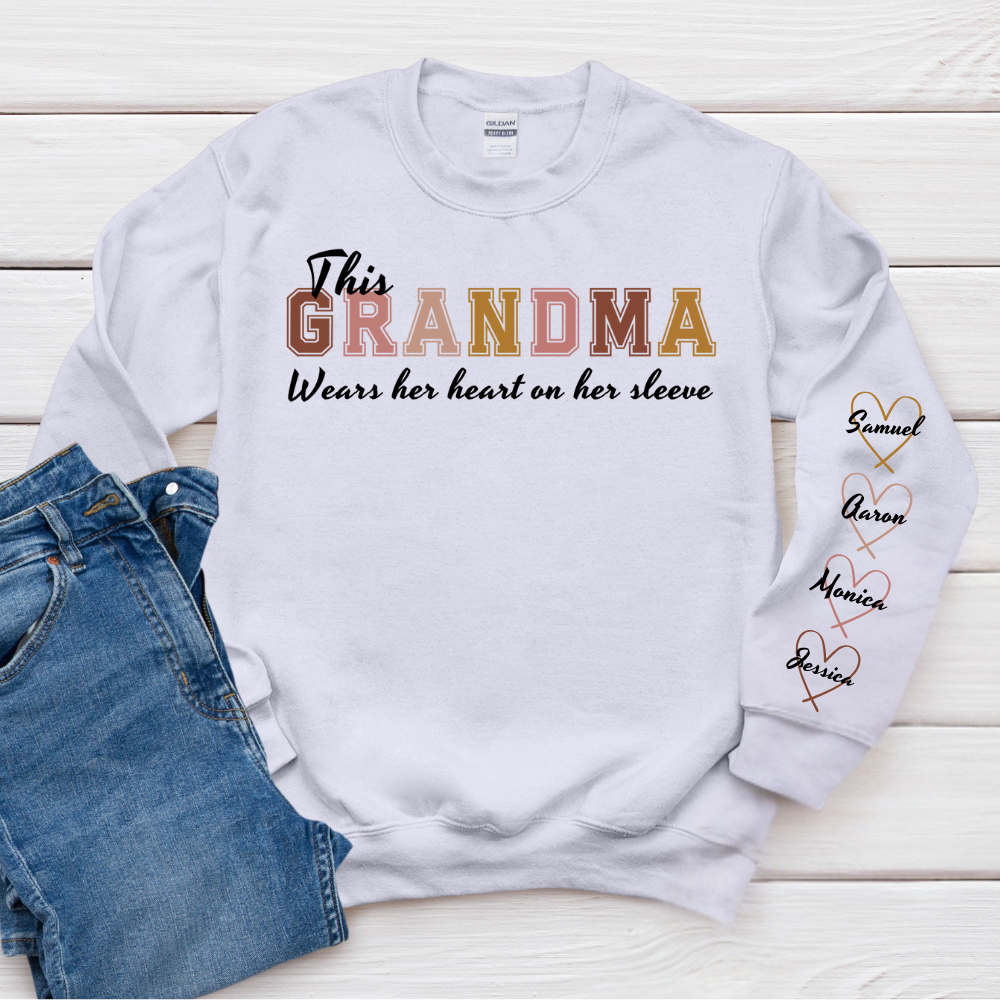 This Grandma Wears Her Heart On Her Sleeve - Family Personalized Custom Unisex Sweatshirt With Design On Sleeve - Gift For Mom, Grandma