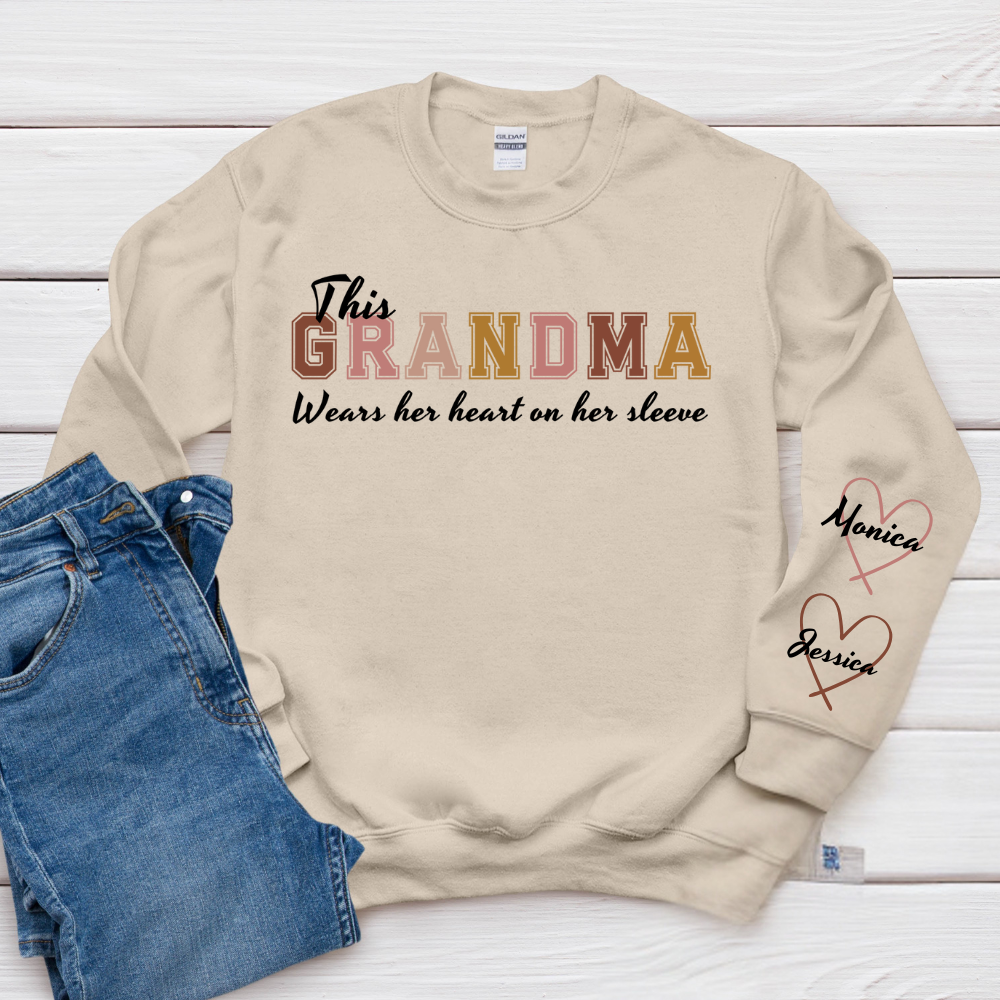 This Grandma Wears Her Heart On Her Sleeve - Family Personalized Custom Unisex Sweatshirt With Design On Sleeve - Gift For Mom, Grandma