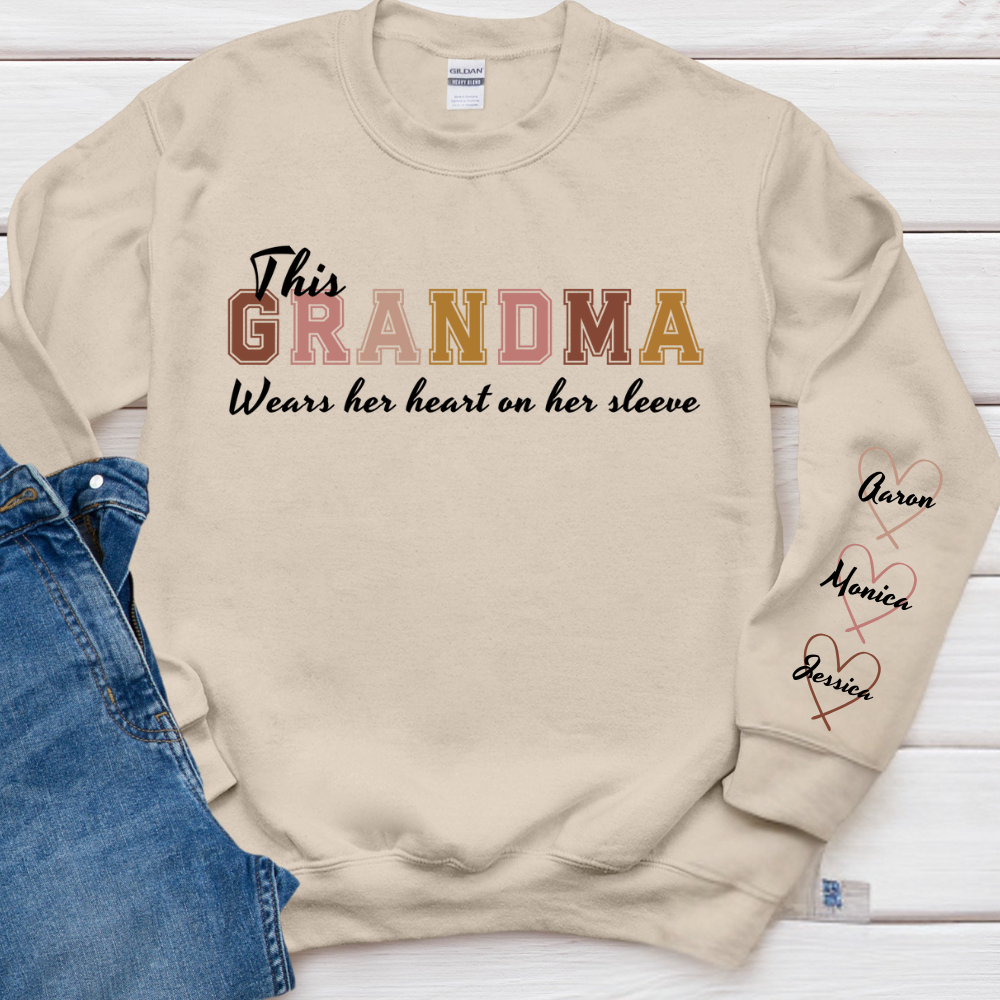 This Grandma Wears Her Heart On Her Sleeve - Family Personalized Custom Unisex Sweatshirt With Design On Sleeve - Gift For Mom, Grandma