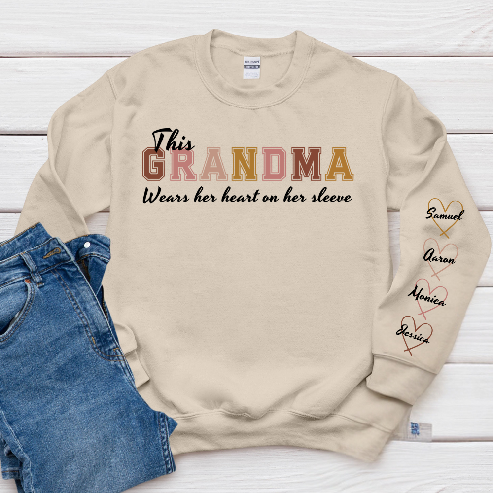 This Grandma Wears Her Heart On Her Sleeve - Family Personalized Custom Unisex Sweatshirt With Design On Sleeve - Gift For Mom, Grandma