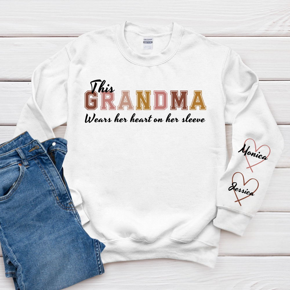 This Grandma Wears Her Heart On Her Sleeve - Family Personalized Custom Unisex Sweatshirt With Design On Sleeve - Gift For Mom, Grandma